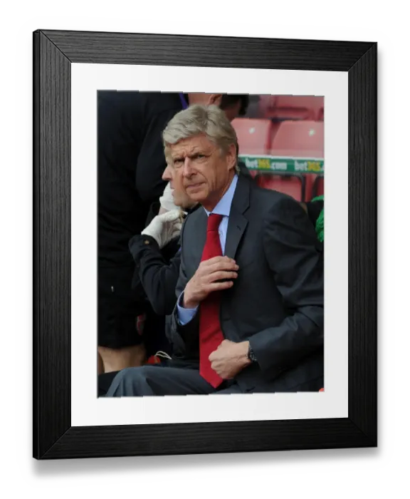 Framed Print : Arsene Wenger: Pre-Match Focus at Stoke City (2012-13)
