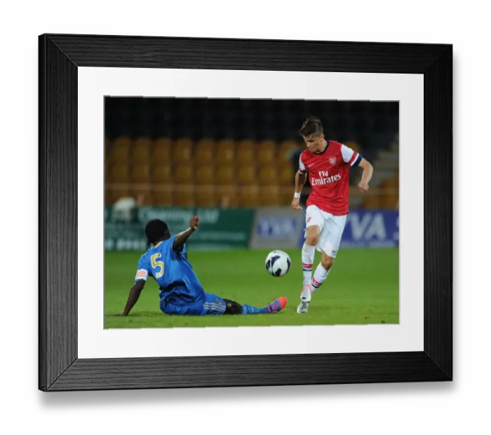 Framed Print : Arsenal's Olsson Outmaneuvers Marseille's Charles in NextGen Series Clash Framed Print : Arsenal's Olsson Outmaneuvers Marseille's Charles in NextGen Series Clash