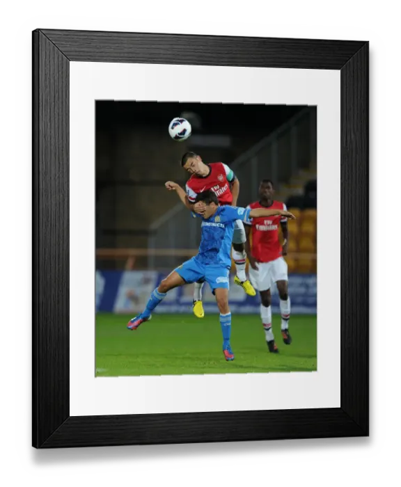 Framed Print : Clash of Young Talents: Nico Yennaris vs. Michel Araujo - Arsenal U19 vs. Marseille (NextGen Series 2012-13)