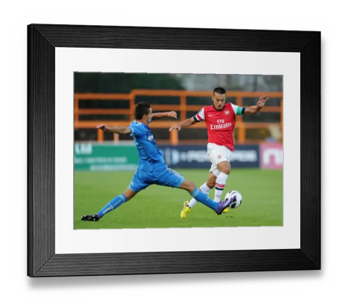 Framed Print : Nico Yennaris vs. Kevin Pommier: Clash of Young Talents in Arsenal U19 vs. Marseille - NextGen Series Framed Print : Nico Yennaris vs. Kevin Pommier: Clash of Young Talents in Arsenal U19 vs. Marseille - NextGen Series