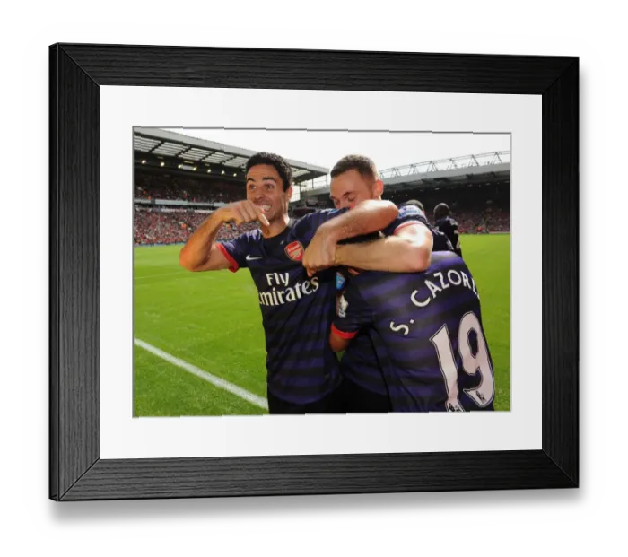 Framed Print : Mikel Arteta and Santi Cazorla: Unforgettable Moment of Arsenal's Victory at Anfield (2012-13) Framed Print : Mikel Arteta and Santi Cazorla: Unforgettable Moment of Arsenal's Victory at Anfield (2012-13)