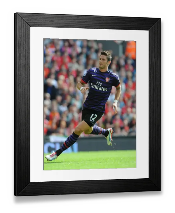 Framed Print : Olivier Giroud Faces Liverpool: Premier League Showdown (2012-13) Framed Print : Olivier Giroud Faces Liverpool: Premier League Showdown (2012-13)