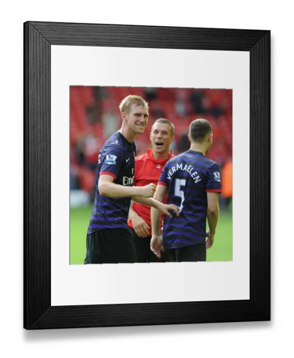 Framed Print : Celebrating Victory: Per Mertesacker, Lukas Podolski, and Thomas Vermaelen of Arsenal Framed Print : Celebrating Victory: Per Mertesacker, Lukas Podolski, and Thomas Vermaelen of Arsenal