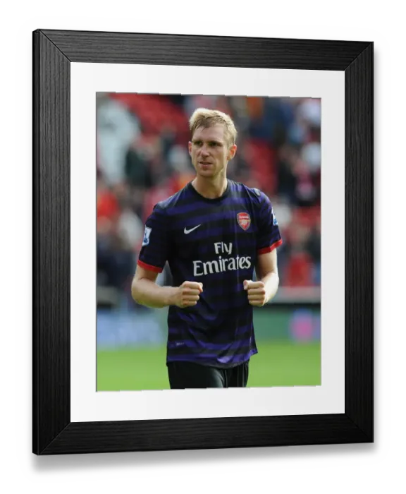 Framed Print : Per Mertesacker's Triumphant Moment: Arsenal's Victory at Anfield, 2012-13 Premier League Framed Print : Per Mertesacker's Triumphant Moment: Arsenal's Victory at Anfield, 2012-13 Premier League