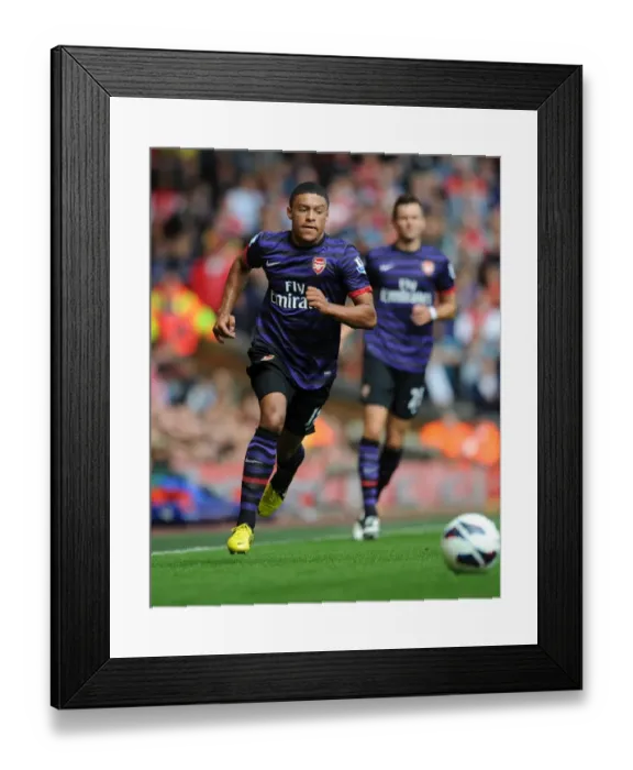 Framed Print : Intense Rivalry: Oxlade-Chamberlain Faces Liverpool in Premier League Showdown (2012) Framed Print : Intense Rivalry: Oxlade-Chamberlain Faces Liverpool in Premier League Showdown (2012)
