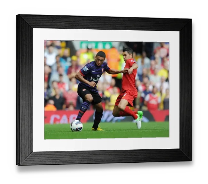 Framed Print : Clash of Midfield Titans: Oxlade-Chamberlain vs. Sahin (2012-13) - Liverpool vs. Arsenal
