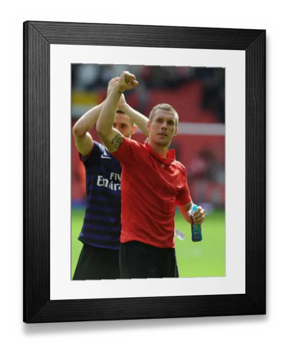 Framed Print : Lukas Podolski Celebrates with Arsenal Fans: Liverpool vs Arsenal, Premier League 2012-13 Framed Print : Lukas Podolski Celebrates with Arsenal Fans: Liverpool vs Arsenal, Premier League 2012-13