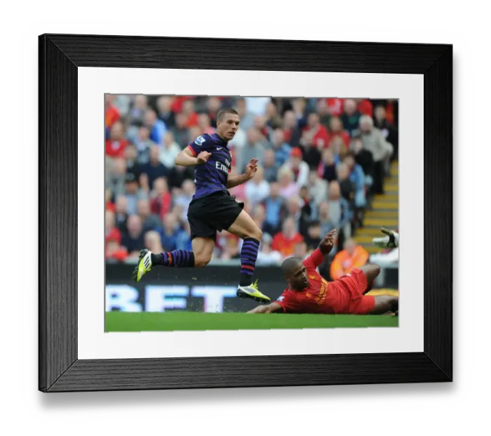 Framed Print : Lukas Podolski Stuns Liverpool: Arsenal's Historic First Goal at Anfield, 2012-13 Premier League