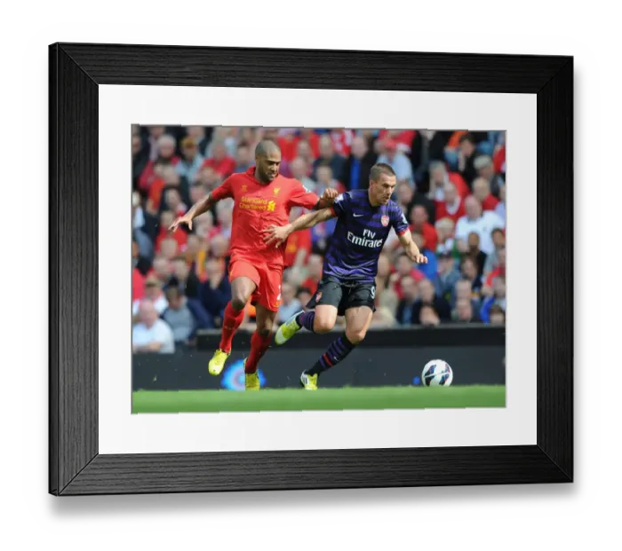 Framed Print : Lukas Podolski vs. Glen Johnson: Intense Battle at Anfield (Liverpool v Arsenal, 2012-13) Framed Print : Lukas Podolski vs. Glen Johnson: Intense Battle at Anfield (Liverpool v Arsenal, 2012-13)