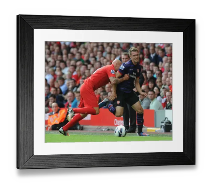 Framed Print : Aaron Ramsey vs Jonjo Shelvey: Intense Rivalry at Anfield (Premier League 2012-13)