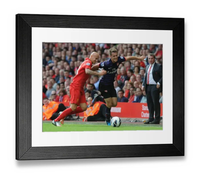 Framed Print : Intense Rivalry: Ramsey vs. Shelvey Clash at Anfield - Premier League 2012-13