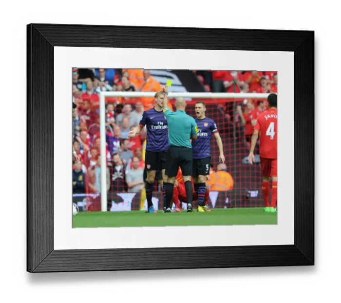 Framed Print : Arsenal's Per Mertesacker Yelled at by Referee during Liverpool Clash (2012-13) Framed Print : Arsenal's Per Mertesacker Yelled at by Referee during Liverpool Clash (2012-13)