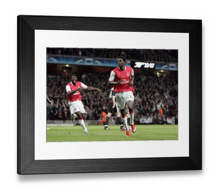 Framed Print : Adebayor and Toure: Unforgettable Goal Celebration in Arsenal's Champions League Quarterfinal vs. Liverpool (2008)