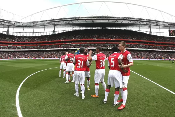 The Arsenal team prepare for the match