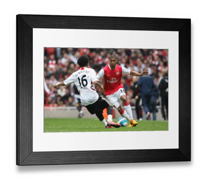 Framed Print : Armand Traore (Arsenal) Jermanie Pennant (Liverpool) Framed Print : Armand Traore (Arsenal) Jermanie Pennant (Liverpool)