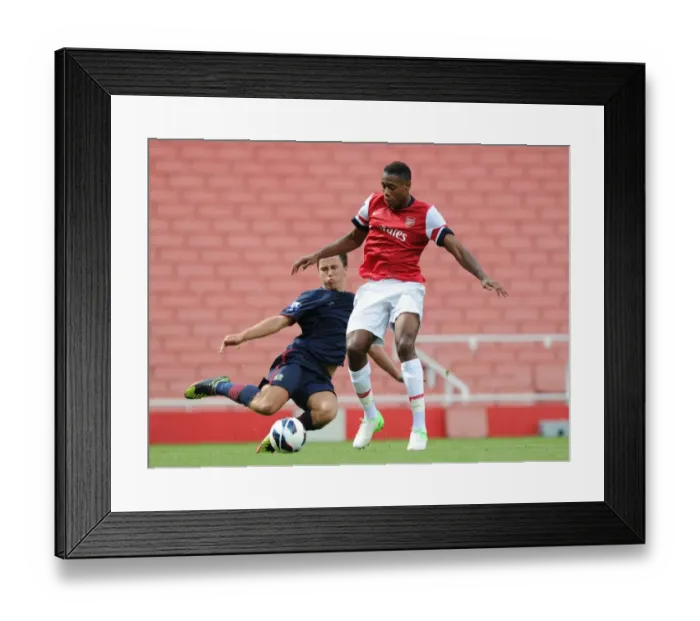 Framed Print : Exclusive: Chuks Aneke vs. John O'Sullivan - Arsenal U21 vs. Blackburn Rover U21, 2012-13