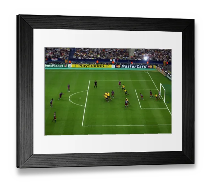 Framed Print : Arsenals wall rushes to charge down Ronaldinho (Barca) shot