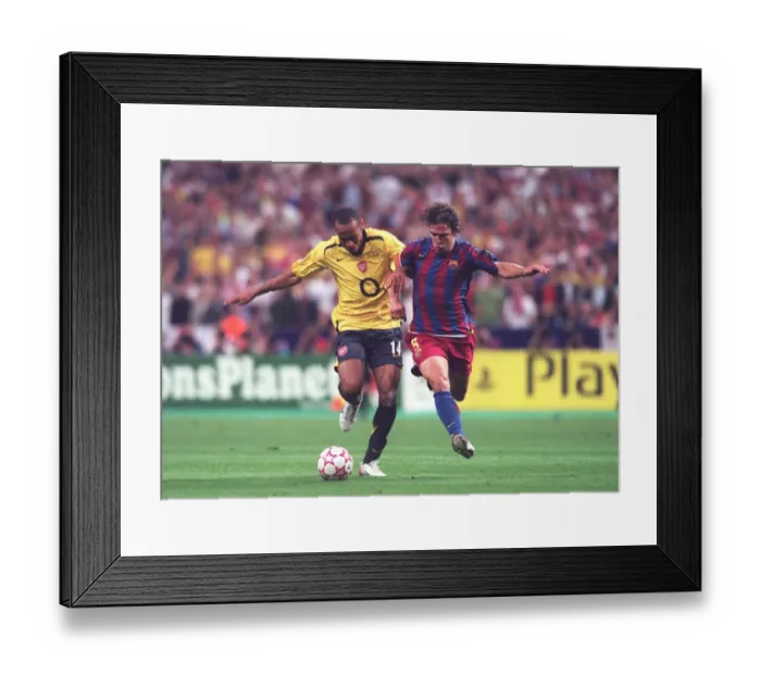 Framed Print : Thierry Henry vs. Carlos Puyol: The Legendary Battle in the 2006 UEFA Champions League Final - Barcelona vs. Arsenal