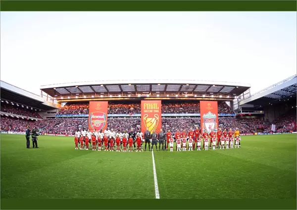 The Arsenal and Liverpool teams line up before the match