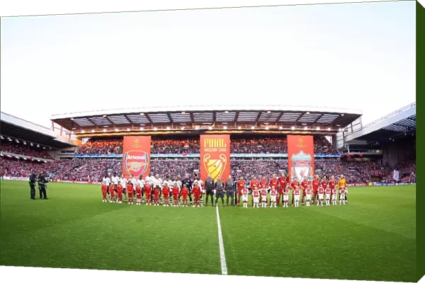The Arsenal and Liverpool teams line up before the match