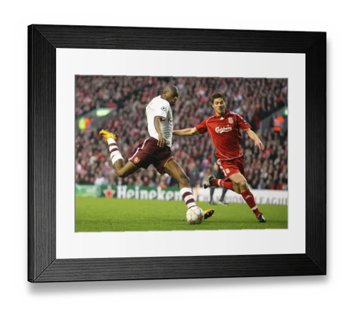 Framed Print : Abou Diaby's Thrilling Goal Under Xabi Alonso's Pressure: Arsenal vs. Liverpool, Champions League Quarterfinal Framed Print : Abou Diaby's Thrilling Goal Under Xabi Alonso's Pressure: Arsenal vs. Liverpool, Champions League Quarterfinal