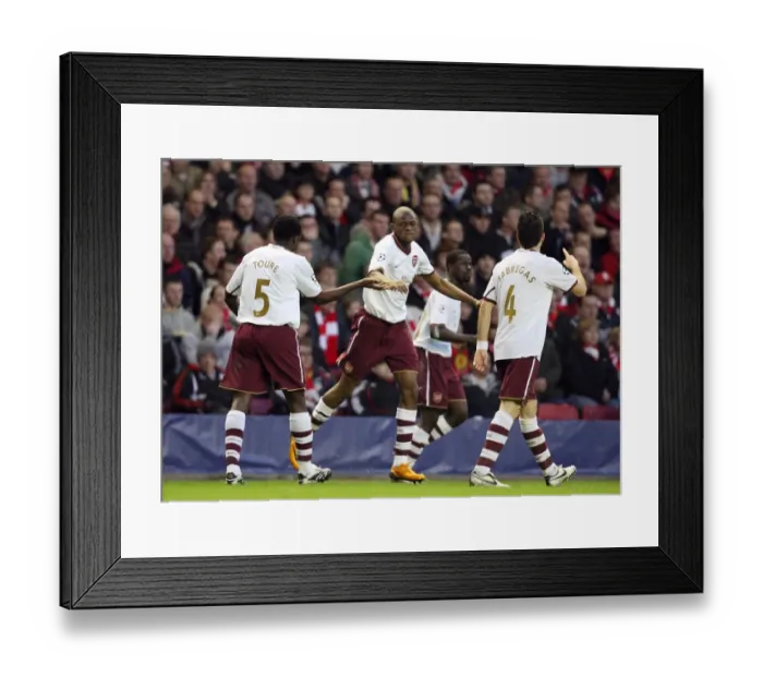 Framed Print : Abou Diaby and Kolo Toure: Unforgettable Goal Celebration in Arsenal's UEFA Champions League Battle at Anfield, 2008