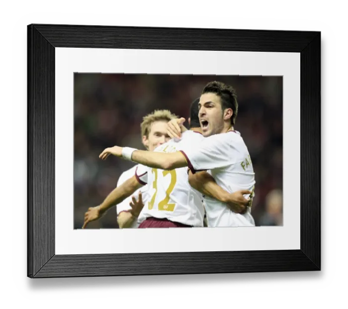 Framed Print : Cesc Fabregas celebrates Arsenals second goal with Theo Walcott