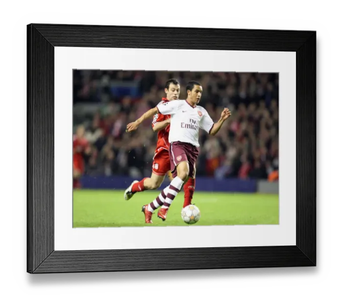 Framed Print : Theo Walcott's Game-Changing Moment: Outmaneuvering Mascherano to Set Up Adebayor's Goal in Arsenal's UEFA Champions League Battle at Anfield Framed Print : Theo Walcott's Game-Changing Moment: Outmaneuvering Mascherano to Set Up Adebayor's Goal in Arsenal's UEFA Champions League Battle at Anfield