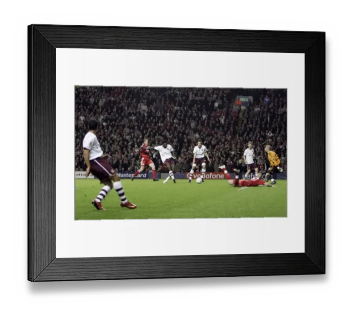 Framed Print : Theo Walcott's Cross Sets Up Adebayor's Goal: Arsenal's Comeback in Champions League Quarterfinal vs Liverpool