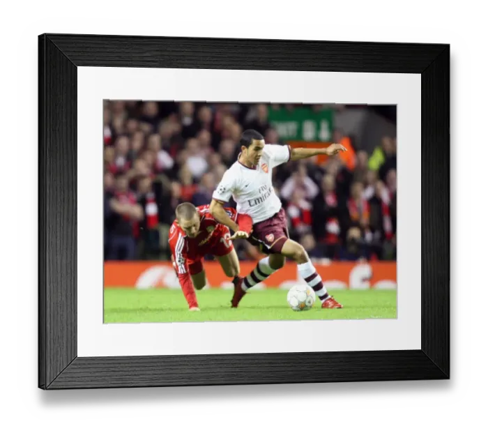 Framed Print : Theo Walcott's Determined Run: Arsenal's Quarterfinal Moment vs. Liverpool in the Champions League Framed Print : Theo Walcott's Determined Run: Arsenal's Quarterfinal Moment vs. Liverpool in the Champions League