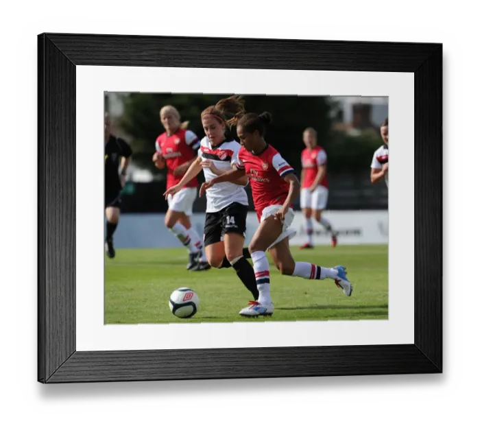 Framed Print : Arsenal's Yankey vs. Walton: A Football Rivalry in Action Framed Print : Arsenal's Yankey vs. Walton: A Football Rivalry in Action