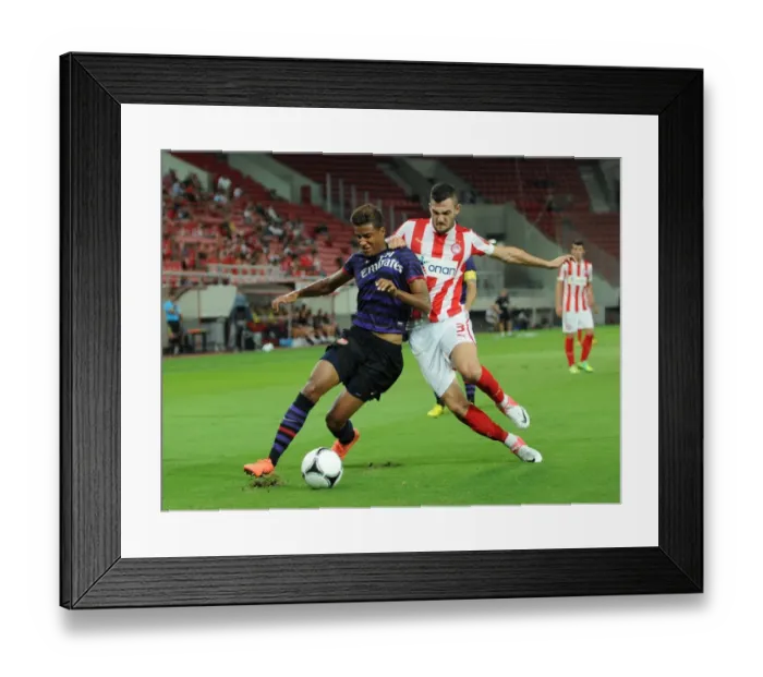 Framed Print : Clash in Piraeus: Angha vs. Lykogiannis in Olympiacos U19 vs. Arsenal U19 NextGen Series Match