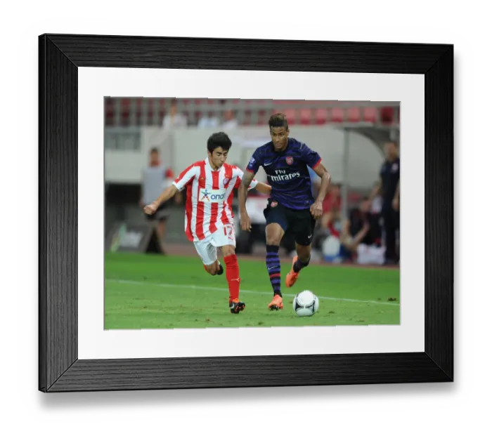 Framed Print : Clash of Young Talents: Angha vs. Pasaliois - Olympiacos vs. Arsenal, NextGen Series