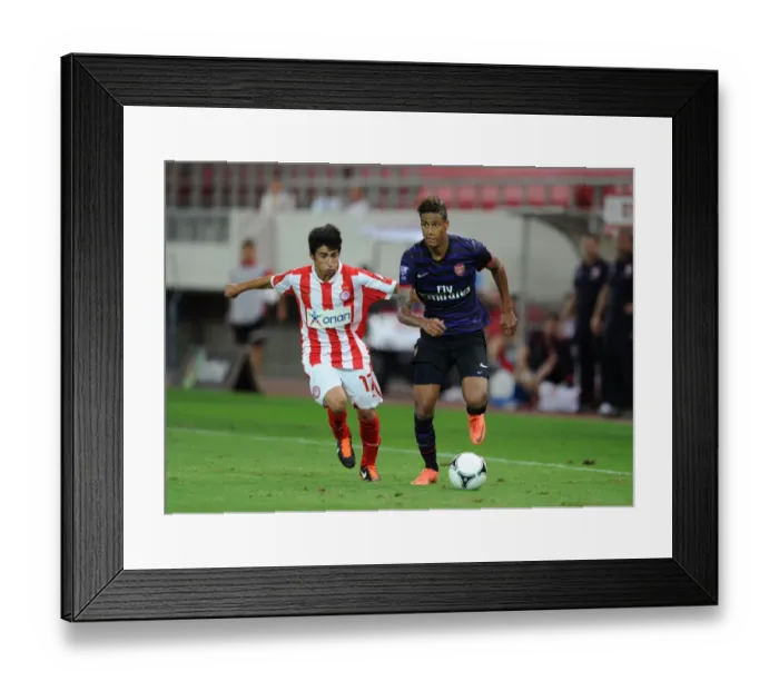 Framed Print : Clash of Young Talents: Angha vs. Pasalis in Olympiacos vs. Arsenal NextGen Series