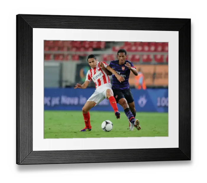 Framed Print : Isaac Hayden vs. Dimitris Rikspun: Clash of Young Talents in Olympiacos vs. Arsenal NextGen Series Framed Print : Isaac Hayden vs. Dimitris Rikspun: Clash of Young Talents in Olympiacos vs. Arsenal NextGen Series