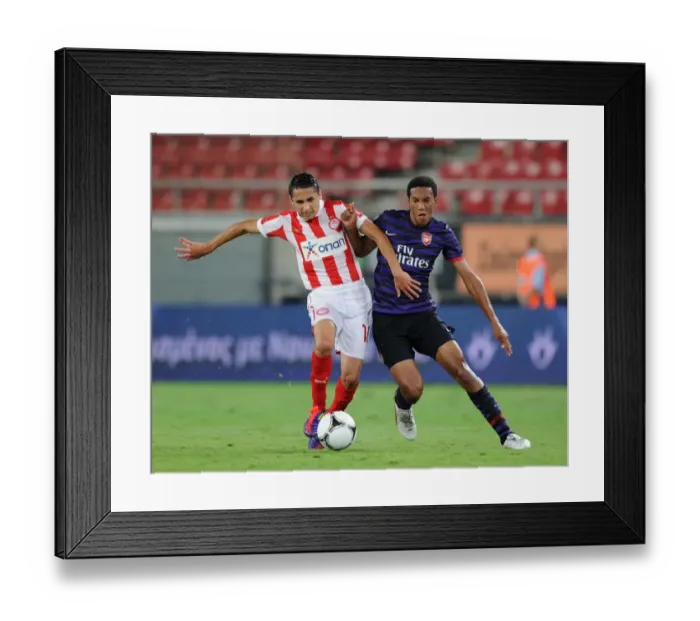 Framed Print : Isaac Hayden vs. Dimitris Rikaspan: Clash of Young Talents in Olympiacos vs. Arsenal NextGen Series Framed Print : Isaac Hayden vs. Dimitris Rikaspan: Clash of Young Talents in Olympiacos vs. Arsenal NextGen Series