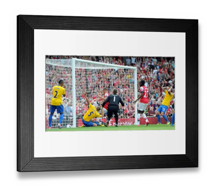 Framed Print : Jos Hooiveld (Soton) scores an own goal. Arsenal 6: 1 Southampton. Barclays Premier League Framed Print : Jos Hooiveld (Soton) scores an own goal. Arsenal 6: 1 Southampton. Barclays Premier League