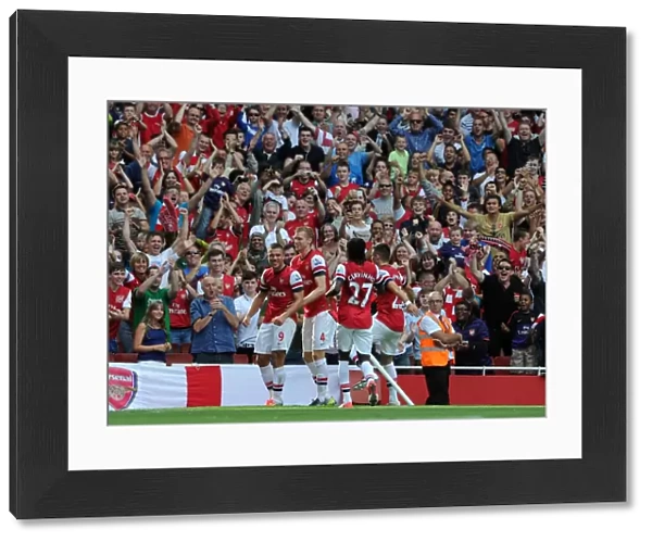Lukas Podolski celebrates scoring the 2nd Arsenal goal. Arsenal 6: 1 Southampton