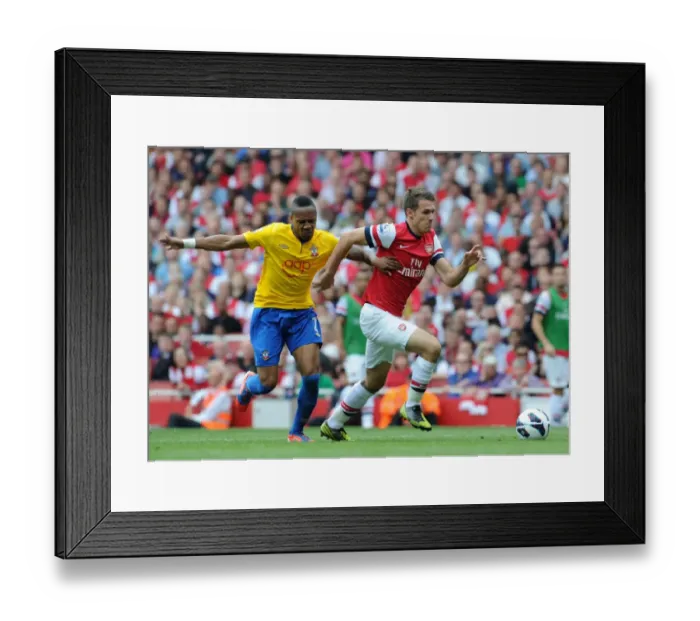 Framed Print : Aaron Ramsey (Arsenal) Nathaniel Clyne (Soton). Arsenal 6: 1 Southampton Framed Print : Aaron Ramsey (Arsenal) Nathaniel Clyne (Soton). Arsenal 6: 1 Southampton