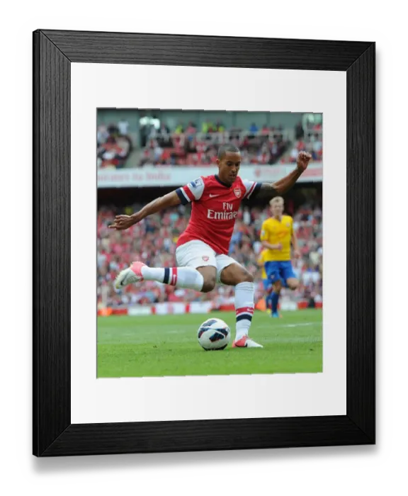 Framed Print : Theo Walcott (Arsenal). Arsenal 6: 1 Southampton. Barclays Premier League