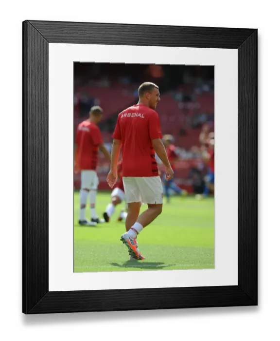 Framed Print : Lukas Podolski (Arsenal). Arsenal 6: 1 Southampton. Barclays Premier League Framed Print : Lukas Podolski (Arsenal). Arsenal 6: 1 Southampton. Barclays Premier League