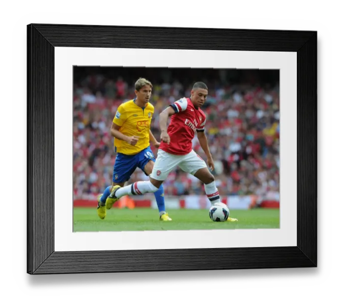Framed Print : Arsenal's Dominant Victory: Oxlade-Chamberlain Shines in 6-1 Rout of Southampton Framed Print : Arsenal's Dominant Victory: Oxlade-Chamberlain Shines in 6-1 Rout of Southampton