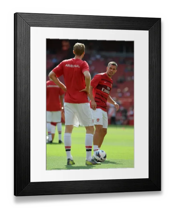 Framed Print : Arsenal's Lukas Podolski Scores in 6-1 Victory over Southampton in Barclays Premier League