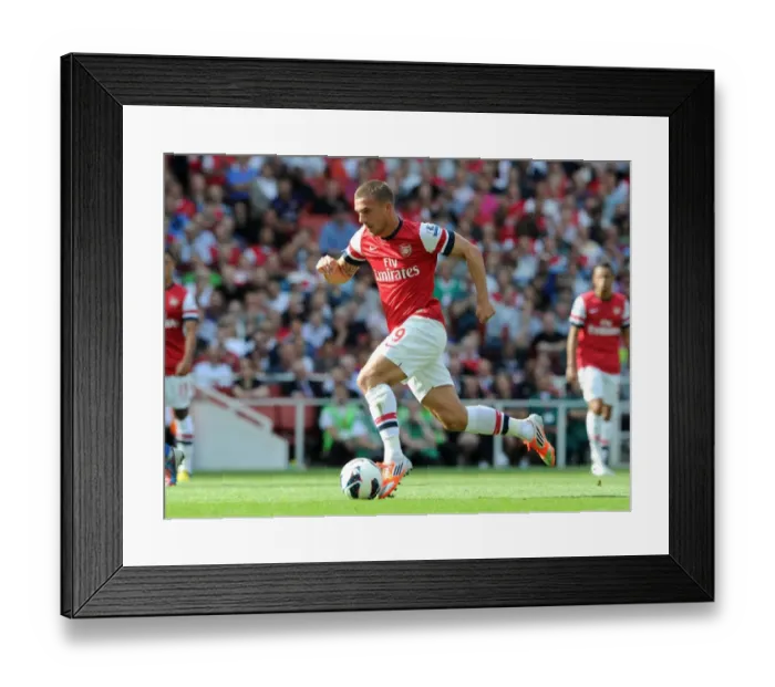 Framed Print : Arsenal's Dominant Victory: Lukas Podolski Scores in 6-1 Rout Against Southampton (Premier League, 2012-13)