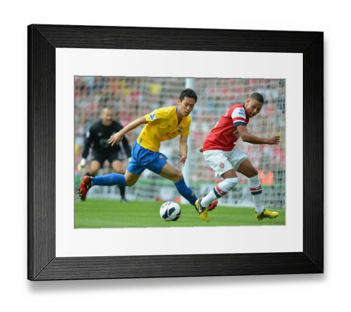 Framed Print : Oxlade-Chamberlain's Brilliance: Arsenal Crushes Southampton 6-1 Framed Print : Oxlade-Chamberlain's Brilliance: Arsenal Crushes Southampton 6-1