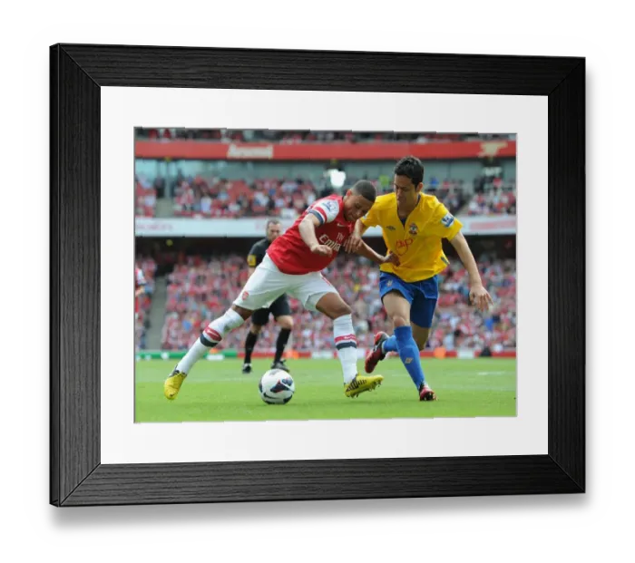 Framed Print : Arsenal's Oxlade-Chamberlain Shines in 6-1 Rout of Southampton