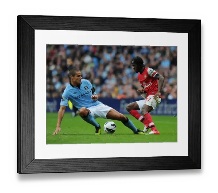 Framed Print : Gervinho vs Jack Rodwell: Manchester City vs Arsenal, Premier League Showdown (2012)