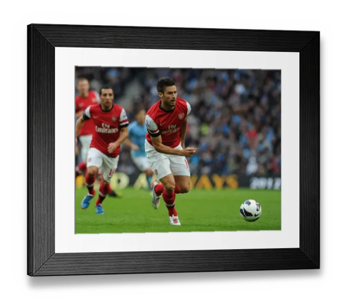 Framed Print : Olivier Giroud Faces Manchester City: Premier League Showdown (2012-13)