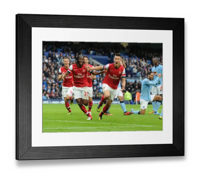 Framed Print : Koscielny, Gervinho, and Giroud's Goal Celebration: Manchester City vs. Arsenal (2012-13)