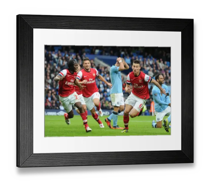 Framed Print : Koscielny, Giroud, Gervinho: Arsenal's Goal Celebration Against Manchester City (2012-13) Framed Print : Koscielny, Giroud, Gervinho: Arsenal's Goal Celebration Against Manchester City (2012-13)